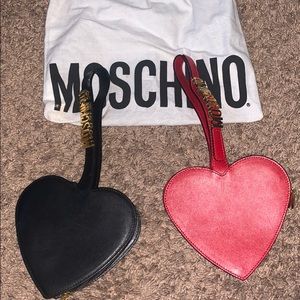 Red wall Moschino Clutch Wristlet
